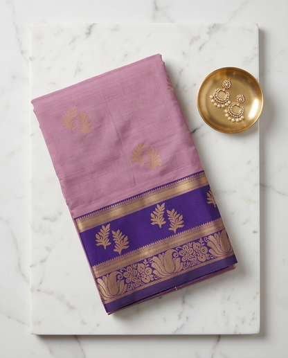Semi silk saree with leaf and floral motifs.saree - light mauve body and a vibrant blue border (SR-PSMP24)